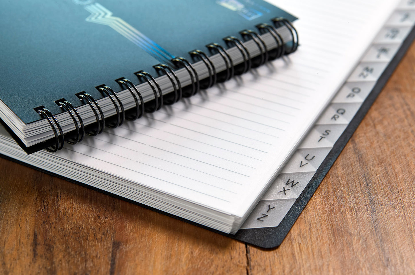 Telephone book, DIN A7, PP, with spiral binding, with embossing, 12-part index, black