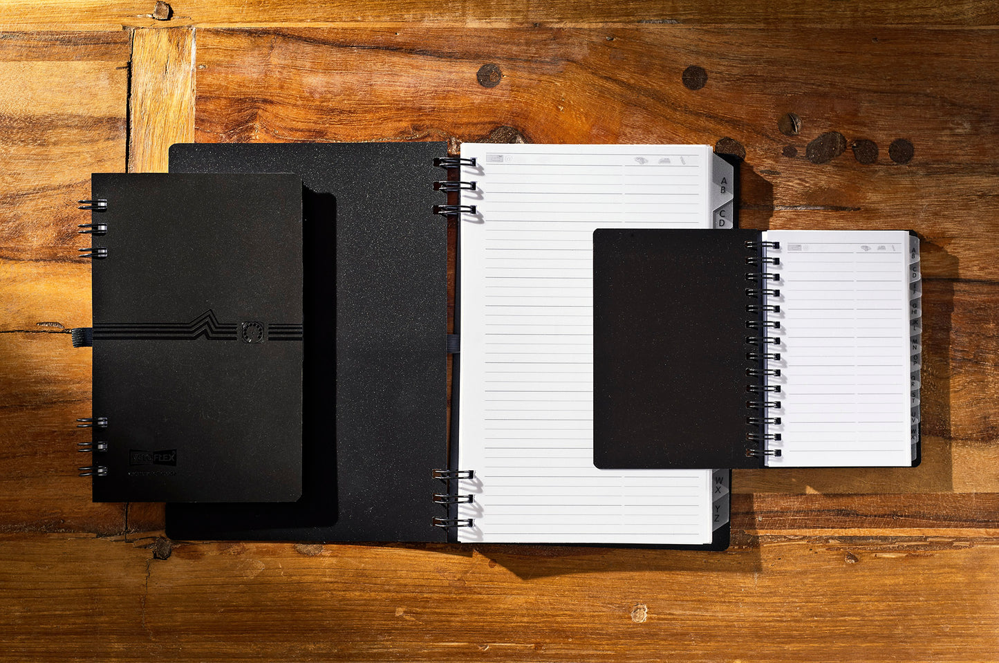 Telephone book, DIN A7, PP, with spiral binding, with embossing, 12-part index, black